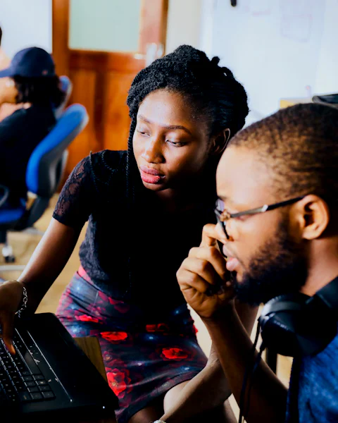 A small team reviewing their website together